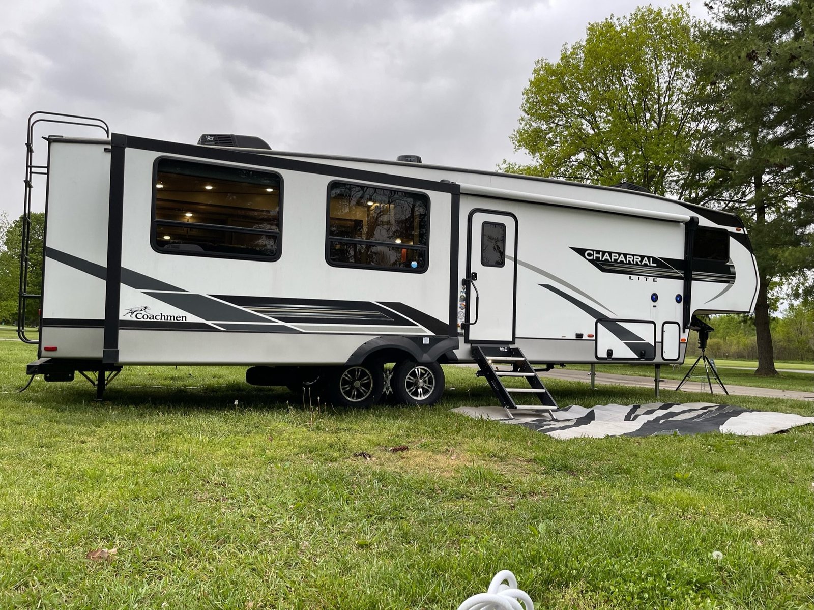 Outdoor RV setup at a scenic campsite